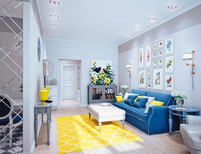 sisustusideoita sininen sohva keltainen matto vaaleat seinät
