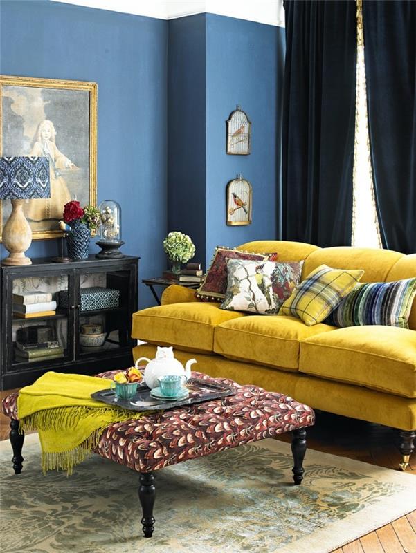 sisustusideoita olohuoneen sininen seinäväri keltainen sohva tyylikäs