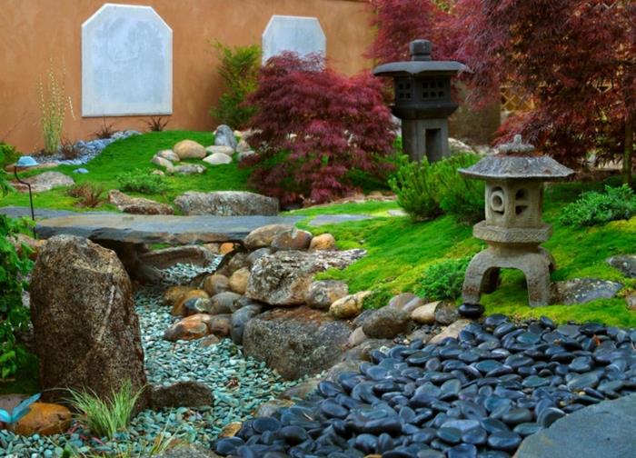 japanilainen puutarha kivi lyhdyt musta lohkareita pikkukiviä vihreä ruoho