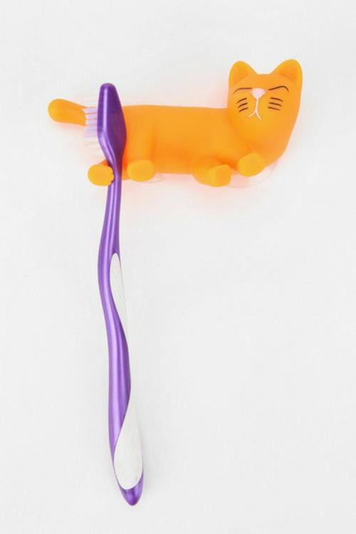 kissan koristeet hammasharjan pidike, joka on valmistettu kumista keltaisena