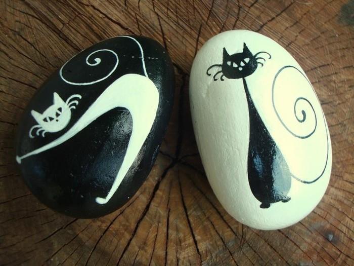 kissojen mustavalkoisten kivien maalausideoita