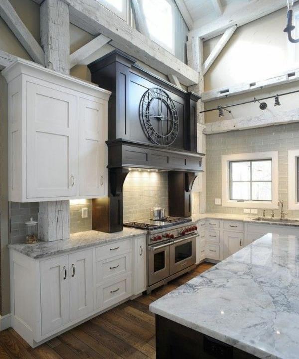 keittiö suunnittelee valkoiset keittiökaapit marmoriset työtasot