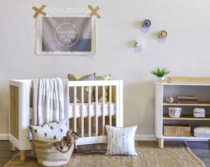 lastenhuone skandinaavinen vauvansänky puinen sisalmatto seinäkoriste