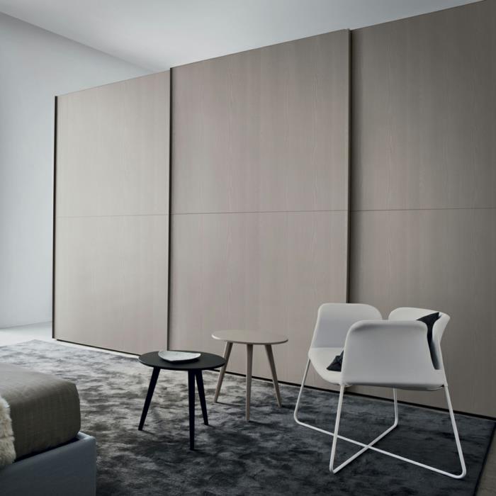 vaatekaappi minimalistinen beige tyylikäs matto sivupöydät