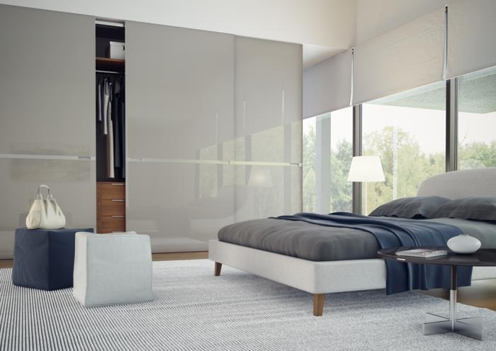 vaatekaappi design liukuovet tyylikäs raidallinen matto makuuhuone