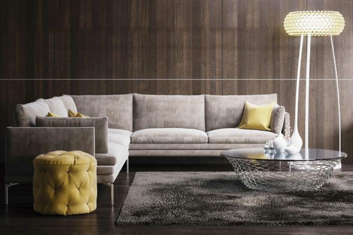 pieni huoneisto sisustus suunnittelija huonekalut sohva matto pyöreä sohvapöytä pouf