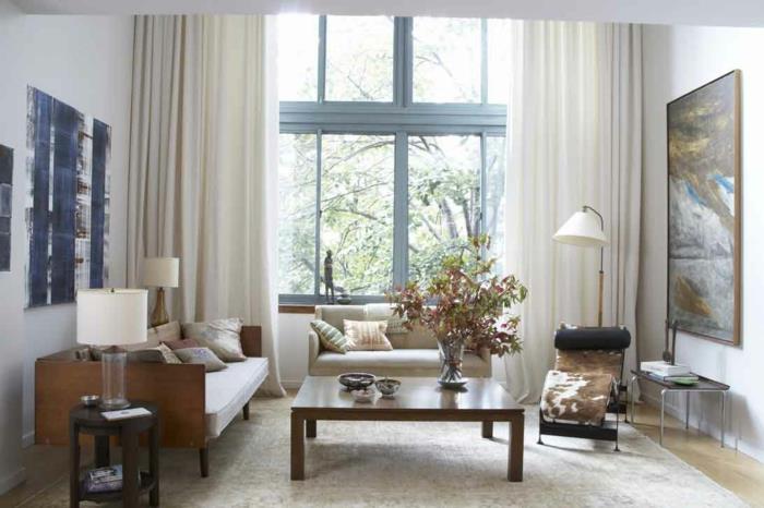 Pienen huoneiston sisustus olohuoneideoita retro -tyylinen sohvapöytä sohva lepotuoli lattiavalaisin