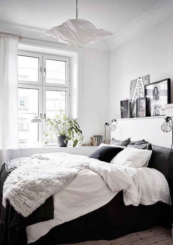 pieni makuuhuone yksinkertainen huoneen suunnittelu mukava sänky visuaalinen kontrasti valkoisen ja mustan välillä