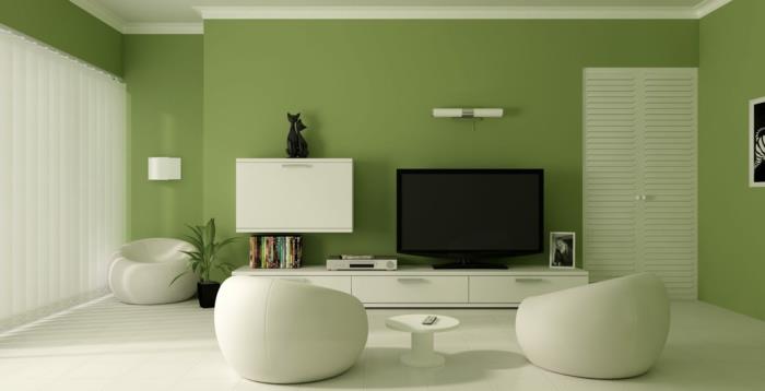 Pieni olohuone seinän väri vihreä valkoinen pyöreä nojatuoli seinähyllyt