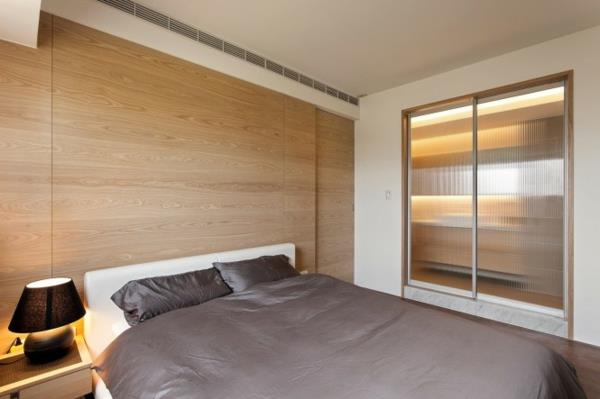 kompakti makuuhuone harmaa ruskea puupaneelisuunnitteluidea minimalistinen