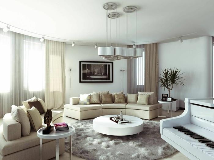 lamput olohuone beige sohvat pyöreä sohvapöytä valkoinen
