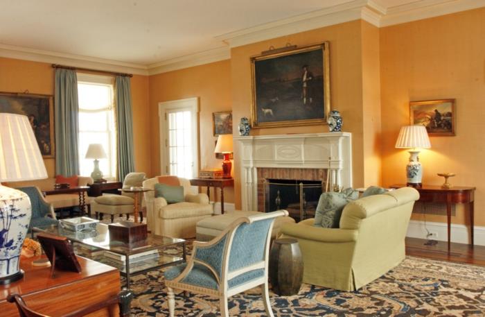maalaistyylinen olohuone oranssi seinäväri tyylikäs matto