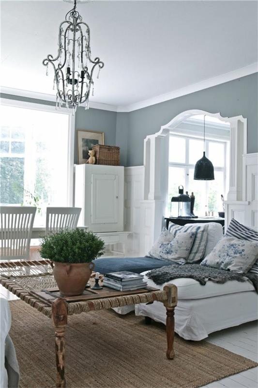 maalaistyylinen olohuone sisalimatto valkoinen tunnelma ruotsalainen tyyli