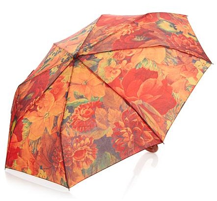Fantastiske trykte orange paraplyer