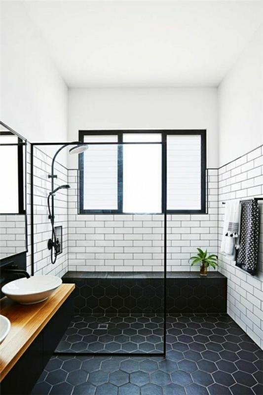 metrolaatat kylpyhuone valkoiset seinälaatat mustat lattialaatat