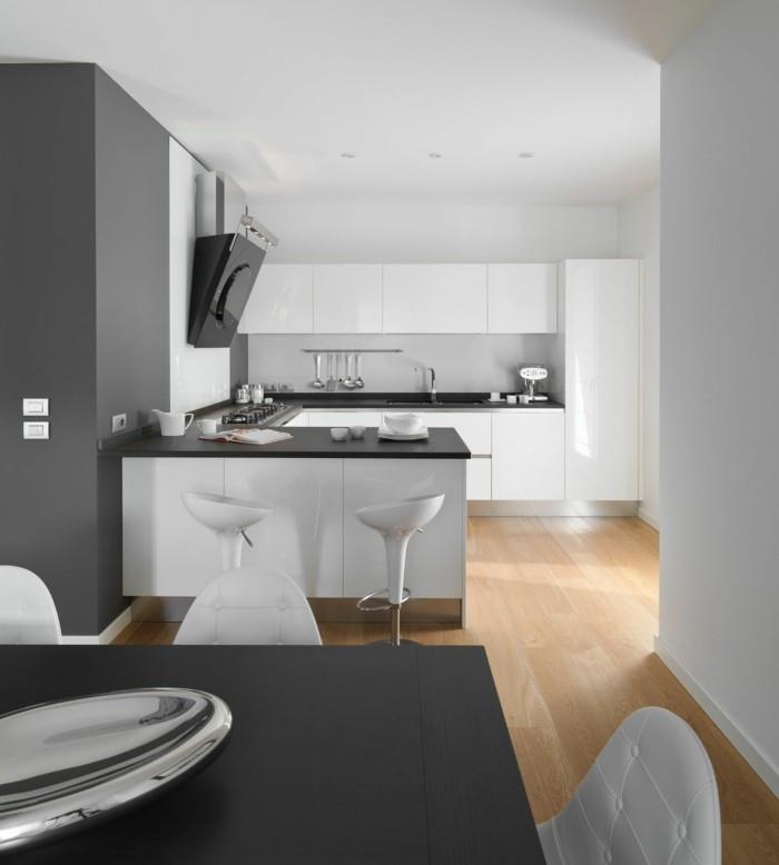 minimalistinen olohuone moderni keittiö mukava ruokailutila