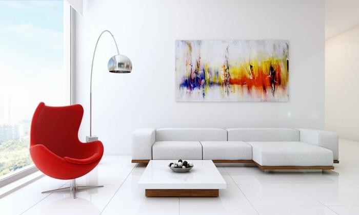 minimalistinen elävät valkoiset seinät punainen nojatuoli valkoinen kulmasohva