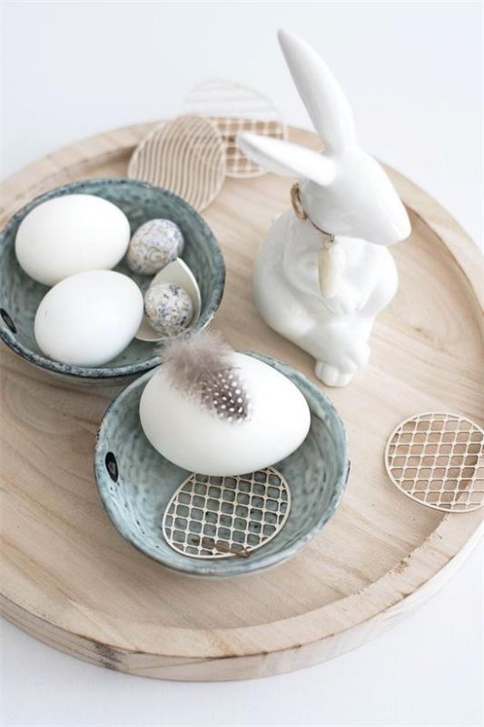 minimalistinen pöytäkoriste pääsiäisen valkoiset munat pupun sulka