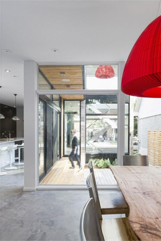 minimalistinen asuinpaikka läpinäkyvä muotoilu sisäänkäynnillä