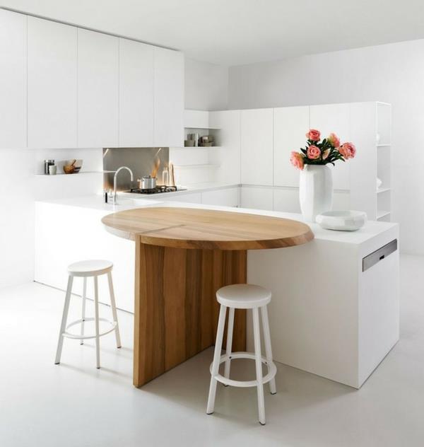 minimalistinen valkoinen keittiö ruokailutila puu elmar studio