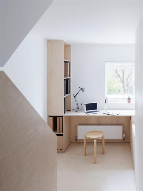 minimalistisessa kotitoimistossa houkutteleva tunnelma valkoinen ja harmaa hallitsevat vaaleaa puuta ja paljon päivänvaloa
