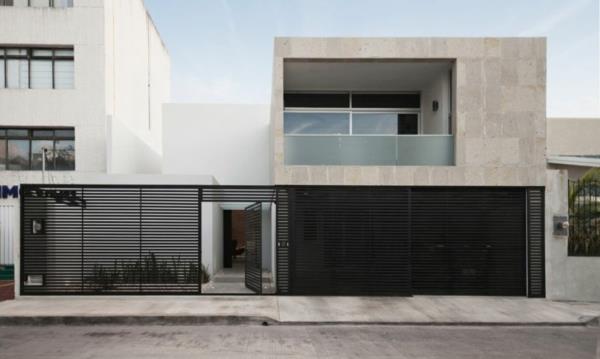 minimalistinen talo teollisella otteella