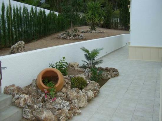 Välimeren hohto puutarhan suunnitteluideoita sypressipalmuja