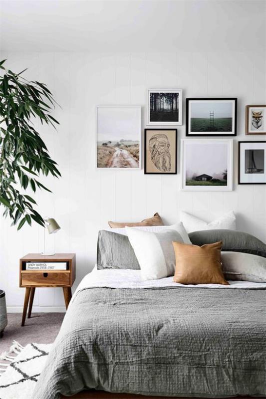 Moderni valokuvaseinä luo mielenkiintoisia kuvia makuuhuoneessa ja koristaa seinän sängyn yläpuolella