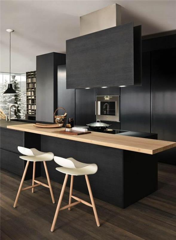 moderni keittiö musta keittiösaari puinen työtaso