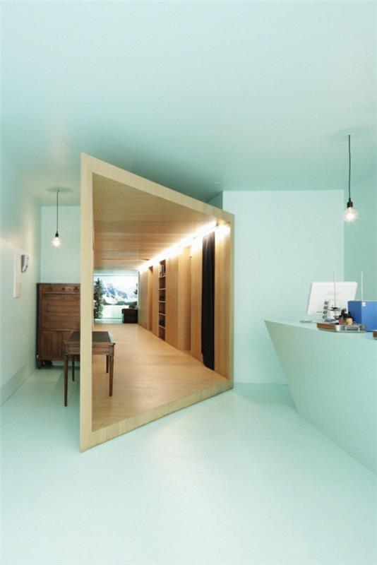 moderni sisustus minttu vihreä seinäväri puiset huonekalut peili