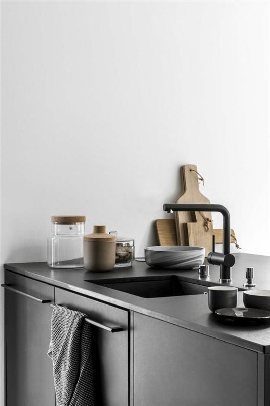 modernit keittiöt mustat keittiökaapit ja valkoiset seinät luovat upean värikontrastin