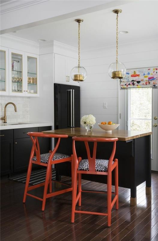 modernit keittiöt valkoinen musta keittiösuunnittelu oranssilla aksentilla