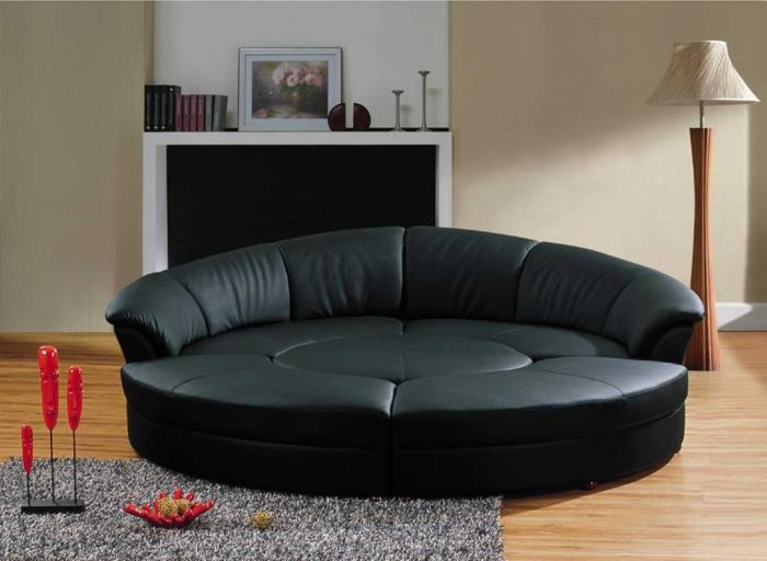 modernit sohvat pyöreä musta nahkasohva, olohuoneen takka