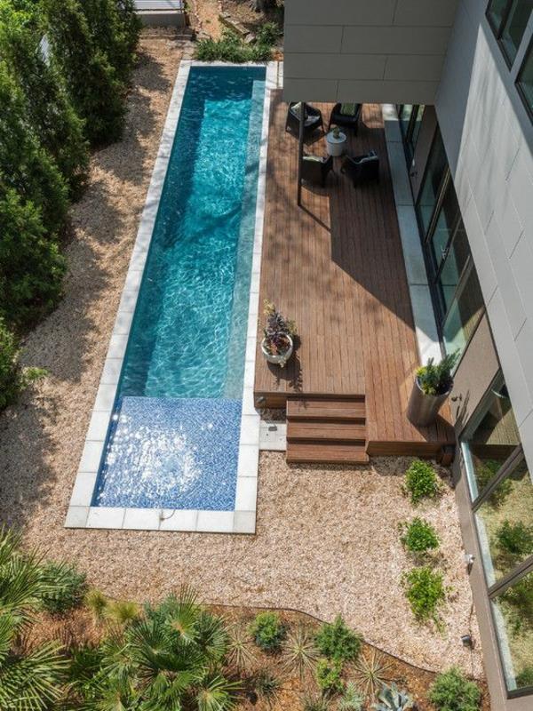 moderni puutarha, jossa on uima -allas, luo kapea uima -allas takapihalle
