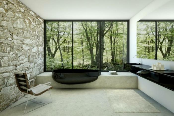 moderni kylpyhuone kylpyamme musta soikea kiviseinä