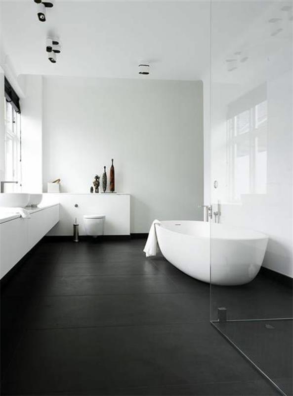 moderni kylpyhuone vaaleat seinät tumma lattia