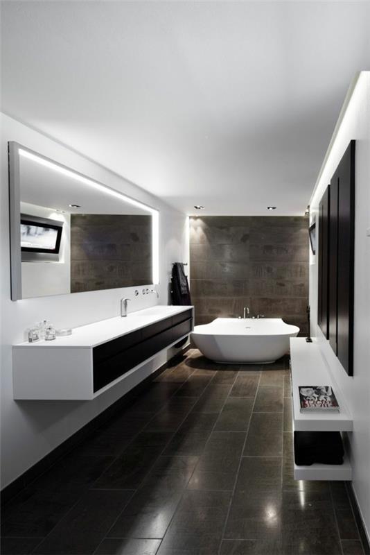moderni kylpyhuone suuret lattialaatat valkoiset kalusteet