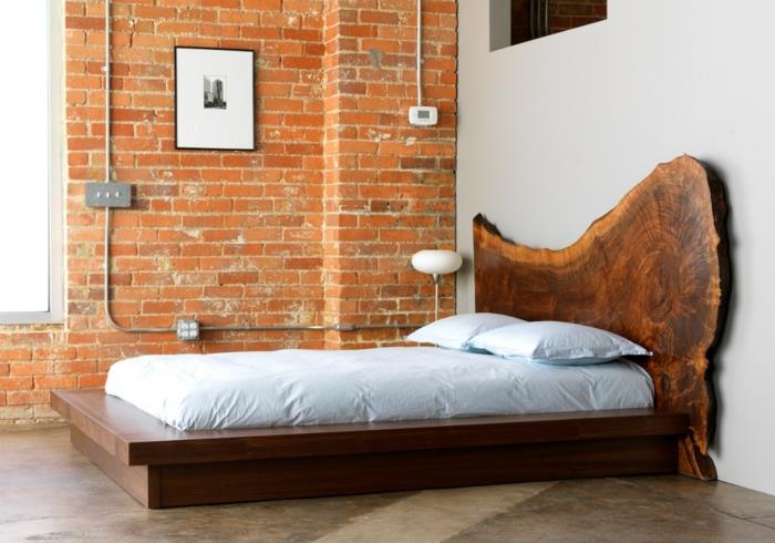 moderni makuuhuoneen sängyn maalaismainen sängynpäätyinen tiiliseinä