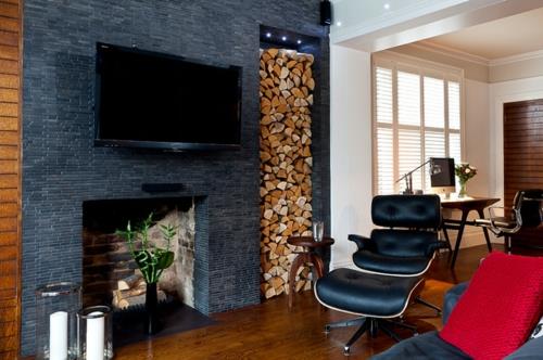 moderni olohuone polttopuuseinä sisäänrakennettu takka lounge nojatuoli musta