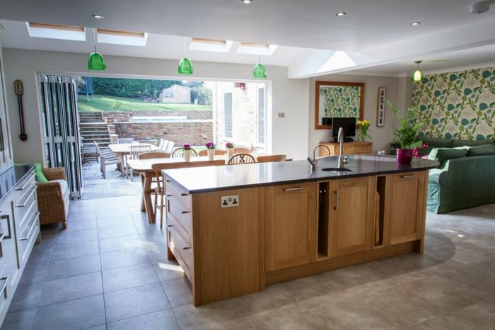avoin keittiö moderni ja toimiva ruoanlaittoalue, jossa lattialaatat ja keittiösaari