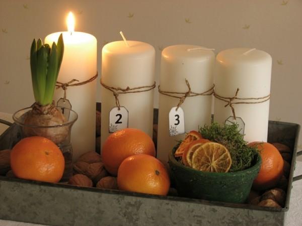 appelsiinit saksanpähkinät valkoiset kynttilät tekevät adventtiseppeleen itse