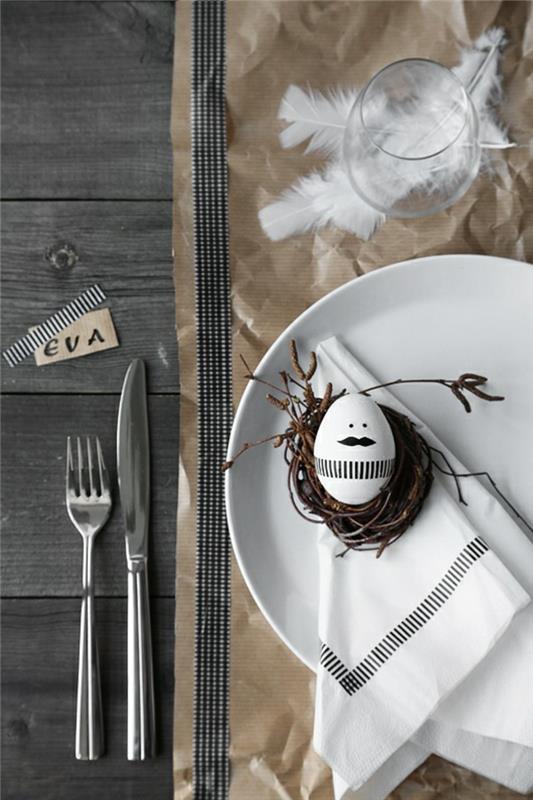 pääsiäiskoristeiden ideoita pääsiäismunia puristinen pöydän koristelu mustavalkoinen sulka