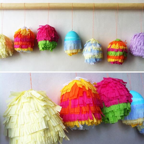 Pääsiäismunat maalaavat piñatan väristä paperia