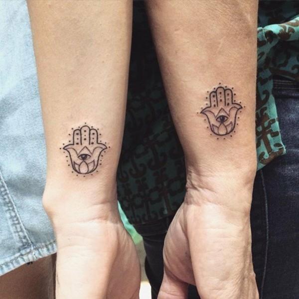 kumppani hamsa tatuointi