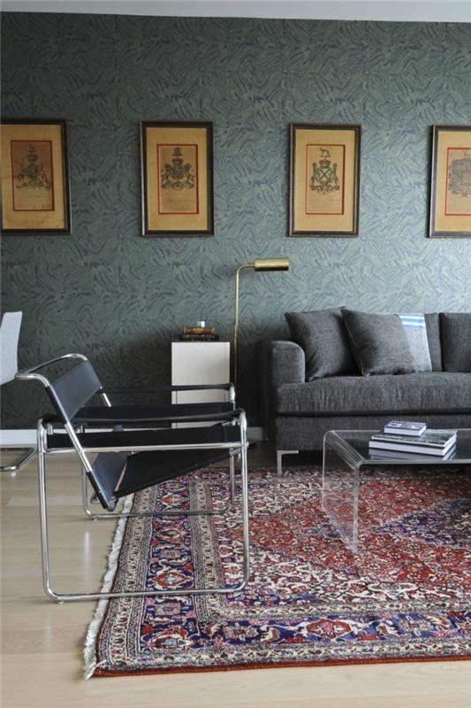 persialaiset matot olohuone harmaa sohva läpinäkyvä sohvapöytä
