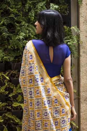 Eye-Shape Back Opening Designer bluse