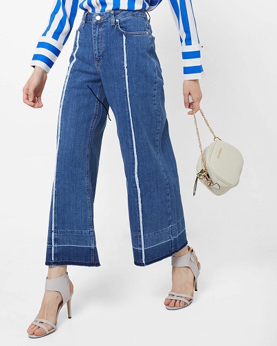 Flared jeans med sidepaneler