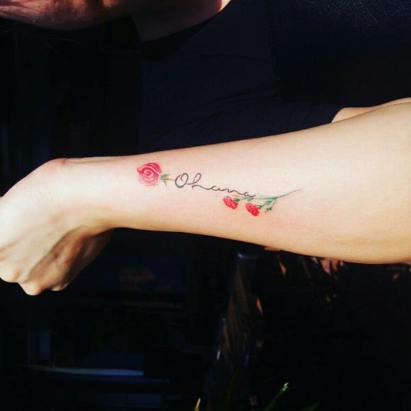 ruusut kyynärvarren ohana -tatuointi