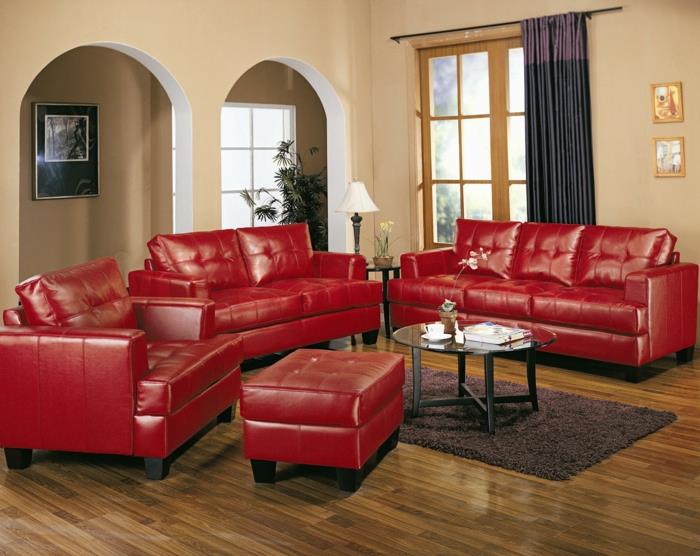 punainen sohva olohuoneen pyöreä sohvapöytä