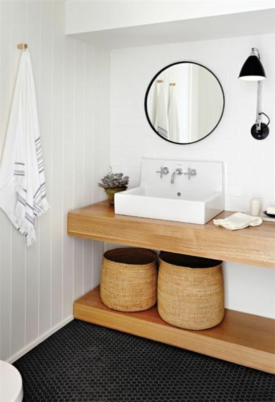 pyöreä kylpyhuoneen peili valkoiset seinät puuelementtejä